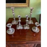 THREE PAIRS OF OLD SHEFFIELD PLATE CANDLESTICKS,