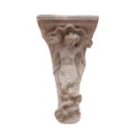 A PAINTED PLASTER WALL BRACKET MODELLED AS A TRITON,