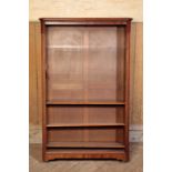 A VICTORIAN WALNUT OPEN BOOKCASE, IN THE MANNER OF HOWARD & SONS, BY WATERER & SONS,