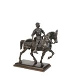 AFTER ANDREA DEL VERROCCHIO, (ITALIAN 1435 - 1488), A PATINATED BRONZE MODEL OF THE EQUESTRIAN...