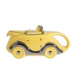 A YELLOW SADLER 'OKT42' MOTORCAR TEAPOT