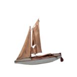 A 1930'S MODEL WOODEN SAILING BOAT