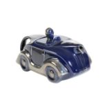 A DARK BLUE MOTORCAR BY RACING TEAPOTS