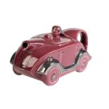 A MAROON MOTORCAR TEAPOT