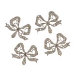 A SET OF FOUR DIAMOND DRESS BOWS