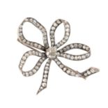 A VICTORIAN DIAMOND BOW BROOCH