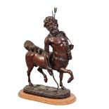A PATINATED METAL MODEL OF A CENTAUR, IN THE MANNER OF THE FURIETTI CENTAURS,