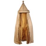 A COTTON AND SILK DRAPED CHANGING TENT