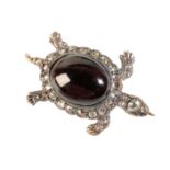 A GARNET AND DIAMOND TORTOISE BROOCH