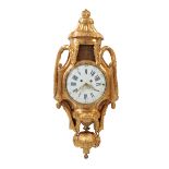 A LOUIS XVI STYLE GILT METAL WALL CLOCK,