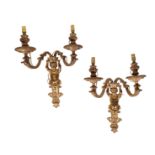 A PAIR OF GILT METAL TWIN LIGHT WALL APPLIQUES