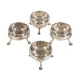 A SET OF FOUR SILVER TABLE SALTS