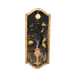 A BLACK LACQUERED AND PARCEL-GILT WALL APPLIQUE