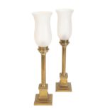 A PAIR OF BRASS COLUMNAR CANDLESTICK LAMPS