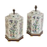 A PAIR OF CHINESE FAMILLE ROSE JAR AND COVERS, CONVERTED TO TABLE LAMPS