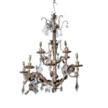 A GILT BRASS TWELVE LIGHT CHANDELIER,