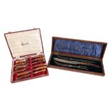 A CASED SILVER BANDED THREE PIECE CARVING SET BY WALKER & HALL