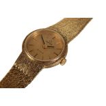 AN OMEGA DE VILLE 18CT GOLD LADY'S BRACELET WATCH