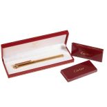 MUST DE CARTIER, PARIS: A GOLD-PLATED FOUNTAIN PEN