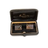 JOSEPH KUTCHINSKY, LONDON: A PAIR OF 15CT WHITE & YELLOW GOLD GENTLEMAN'S CUFFLINKS