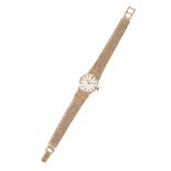 AN OMEGA 9CT GOLD LADY'S BRACELET WATCH