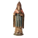 A POLYCHROME-DECORATED CARVED LIMEWOOD FIGURE OF A POPE Probably late 16th century,