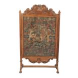 A LARGE WALNUT FIRESCREEN in the manner of Daniel Marot