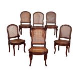 A SET OF EIGHTEEN FRENCH OAK SIDE CHAIRS: