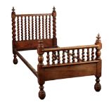 A 17TH CENTURY STYLE WALNUT BED