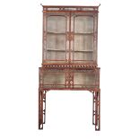 A MID-VICTORIAN WALNUT DISPLAY CABINET-ON-STAND