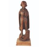 A NORTH EUROPEAN CARVED WOOD FIGURE OF A KNIGHT