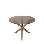 RENATO ZEVI FOR ROCHE BOBOIS: A GLASS TOPPED DINING TABLE