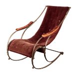 A STEEL FRAMED ROCKING-CHAIR IN THE MANNER OF R W WINFIELD & SON