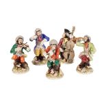 A SET OF FIVE MEISSEN STYLE MONKEY BAND FIGURES