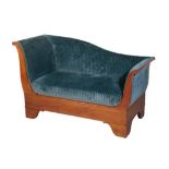 AN EMPIRE STYLE MAHOGANY SETTEE