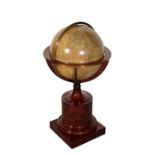 A FRENCH BRASS MOUNTED MAHOGANY TABLE GLOBE