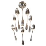 A COLLECTION OF SILVER SERVING SPOONS