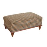 A MAHOGANY UPHOLSTERED STOOL