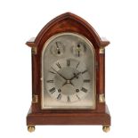 AN EDWARDIAN MAHOGANY BRACKET CLOCK