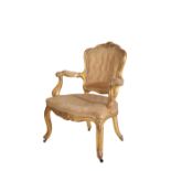 A CARVED AND GILTWOOD FAUTEUIL , IN LOUIS XV STYLE,