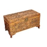 A CARVED CAMPHOUR WOOD CHINESE CHEST