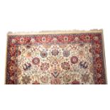 A LARGE PERSIAN STYLE RUG