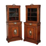 A PAIR OF 19TH CENTURY SATINWOOD, PORCELAIN AND ORMOLU MOUNTED CABINETS
