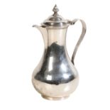 A GEORGE II SILVER WATER JUG