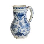 A DELFT BLUE AND WHITE PEAR SHAPED TANKARD