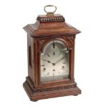 A LATE VICTORIAN OAK CASED BRACKET CLOCK