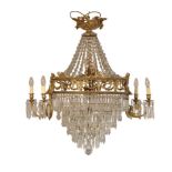 A GILT METAL AND CUT GLASS CHANDELIER