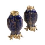 A PAIR OF PORCELAIN AND ORMOLU MOUNTED 'FISH' VASES