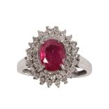 A SYNTHETIC RUBY AND DIAMOND CLUSTER RING