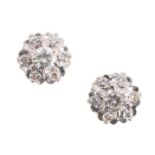 A PAIR OF DIAMOND CLUSTER EARRINGS